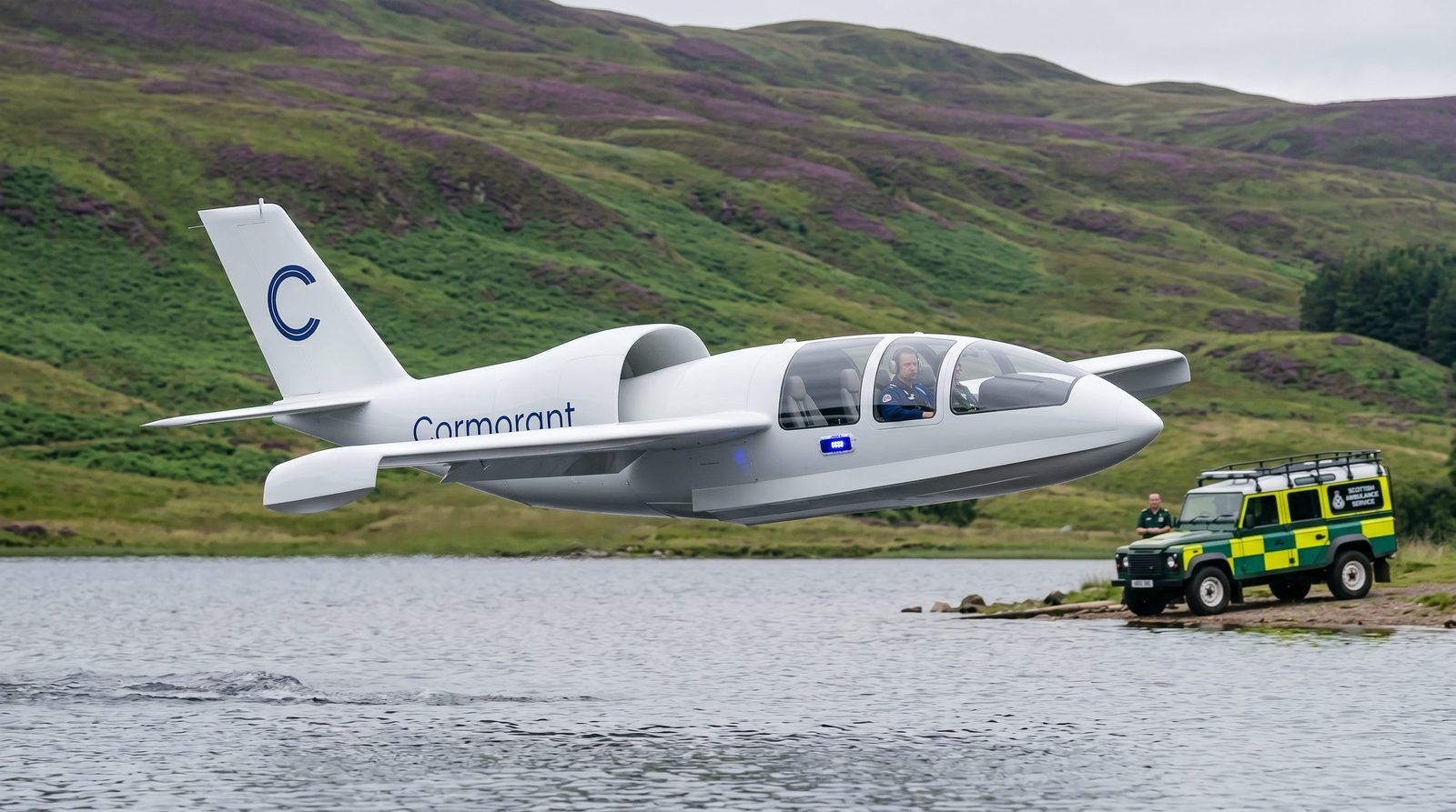 Cormorant low over water near a Scottish Ambulance Service vehicle on shore