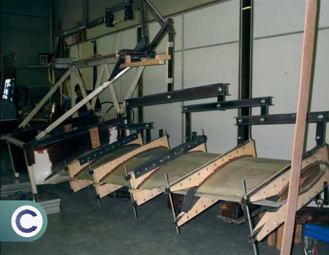 Archival black and white photo of an early wing-spar structural test rig